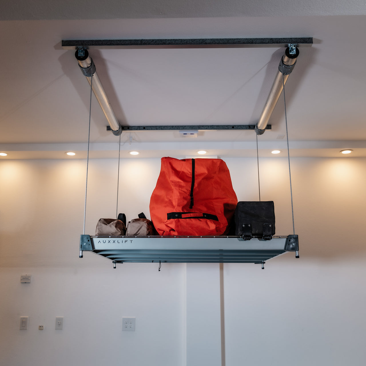 Auxx-Lift – Motorized Overhead Garage Storage Platform